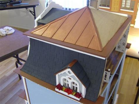 how to apply fake snow to roof of doll house